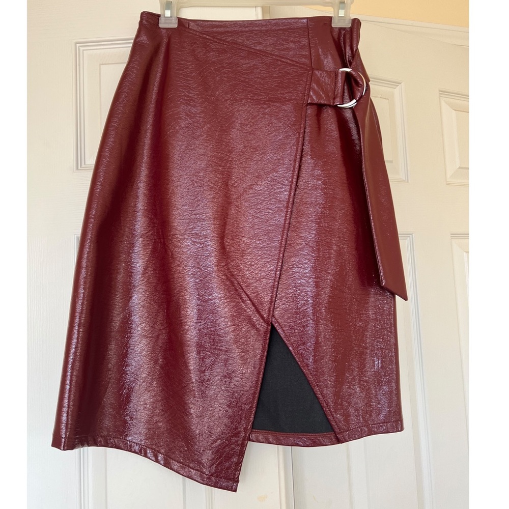Worn once skirt with attached belt loop, very sexy.